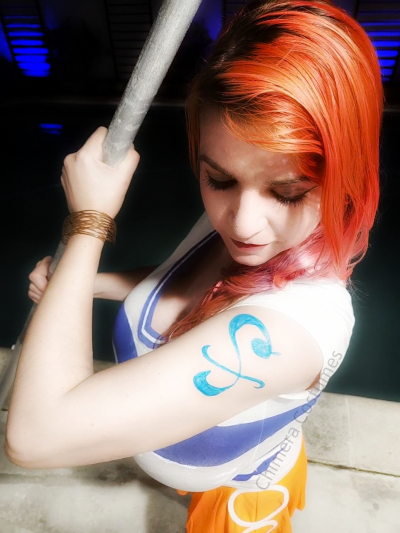Dive into the vibrant seas of Chimera Costumes' Nami cosplay—meticulously crafted details, vivid colors, and an adventure-ready ensemble.