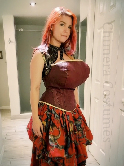 Chimera Costumes enchants with the Renfaire Dragon Dress—a fusion of fantasy and medieval elegance for a captivating Renaissance Faire experience.